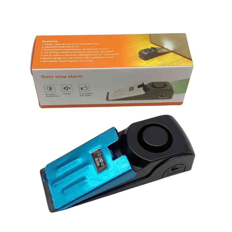 Tranca para puertas, cuña con alarma, batería 9v, en caja