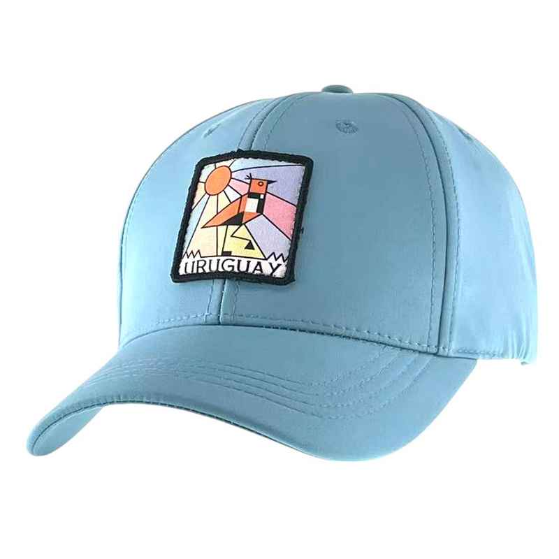 [HP1058B] Gorro con visera, Uruguay con aplique tero, CELESTE, Armoric