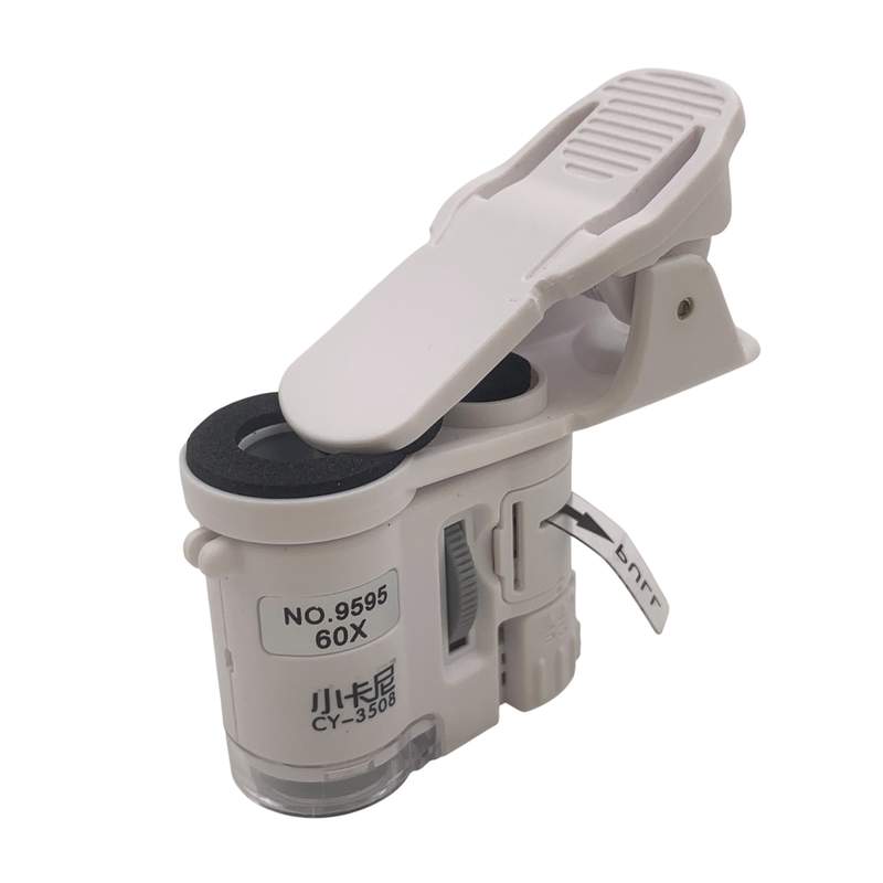 [JU8320] Microscopio de mano con clip, luz LED y UV, 60 aumentos, en caja